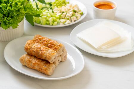 Vietnamese pork  meatball with vegetables wraps (Nam-Neaung or Nham Due) - vietnamese traditional food cultureの写真素材