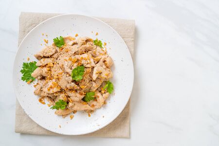 stir-fried chicken with garlic and pepperの写真素材