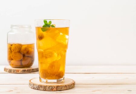 Chinese plum juice with ice and mintの写真素材