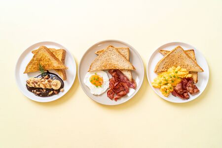 breakfast set (fried egg with bread toasted and bacon, scramble egg with bread toasted and bacon,...