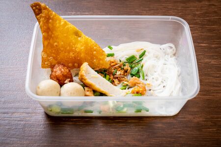 noodles with fish ball and minced pork in delivery box - Asian food styleの写真素材