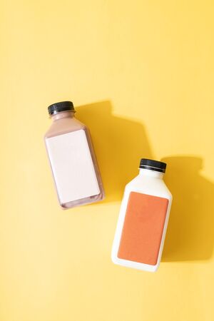 almond milk and almond chocolate milk bottleの写真素材