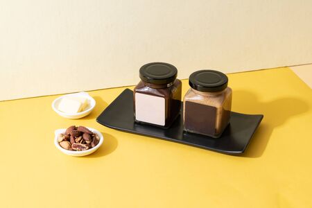 almond butter spread and almond chocolate butter spread jarの写真素材