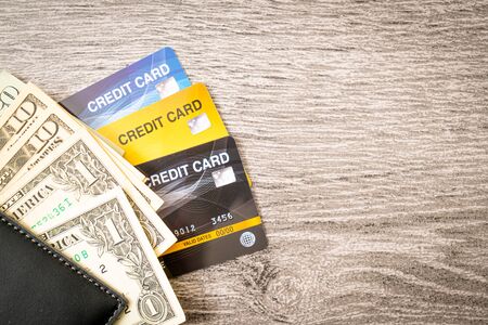 wallet with money and credit card - Economy and finance conceptの写真素材