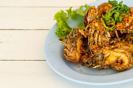 fried crayfish or mantis shrimps with garlic - seafood style