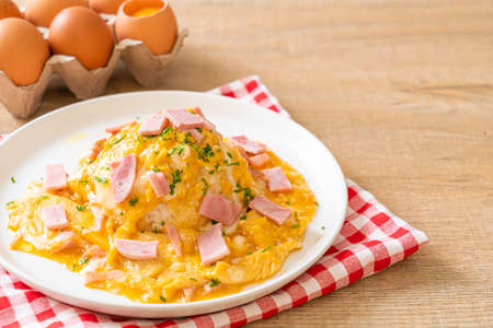 Creamy Omelet with Ham on Rice or Rice with Ham and Soft Omeletの写真素材