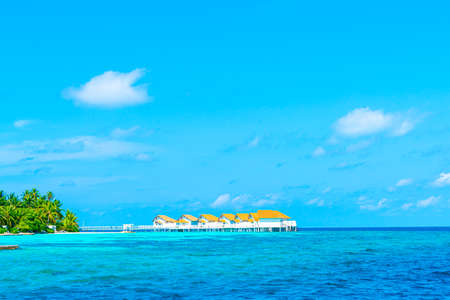 tropical Maldives resort hotel and island with beach and sea for holiday vacation concept - boost up color processing styleのeditorial素材