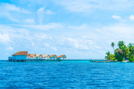 tropical Maldives resort hotel and island with beach and sea for holiday vacation concept - boost up color processing styleのeditorial素材