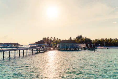 Beautiful tropical Maldives resort hotel and island with beach and sea  - boost up color processing styleのeditorial素材