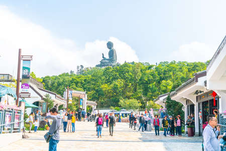 HONG KONG - FEB 21, 2019: Tian Tan Buddha aka the Big Buddha is a large bronze statue of a Sakyamuni Buddha and located at Ngong Ping Lantau Island in Hong Kong.のeditorial素材
