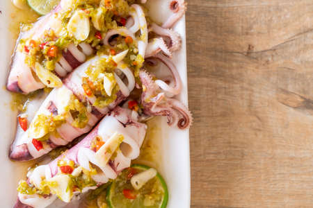 Steamed Squids or Octopus with Spicy Chili and Lemon Lime Sauceの写真素材
