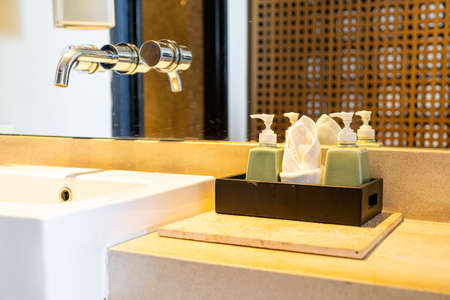 soap or lotion pump bottle in bathroomの写真素材