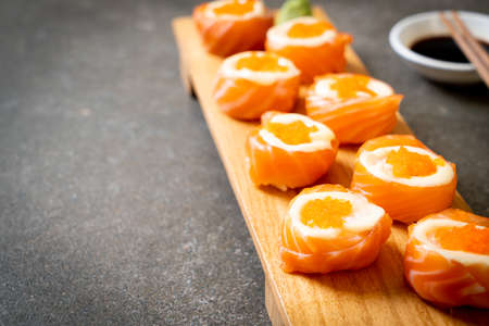 fresh salmon sushi roll with mayonnaise and shrimp egg - Japanese food styleの写真素材