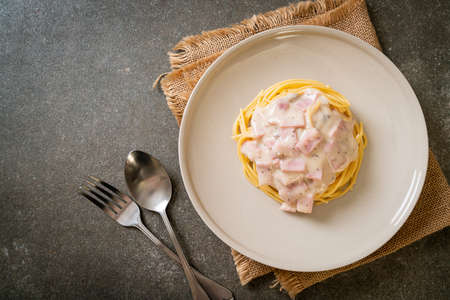 homemade spaghetti white cream sauce with ham - Italian food styleの写真素材