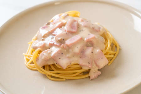 homemade spaghetti white cream sauce with ham - Italian food styleの写真素材