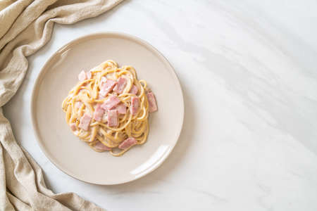 homemade spaghetti white cream sauce with ham - Italian food styleの写真素材