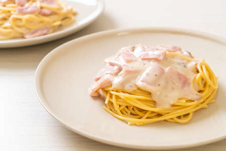 homemade spaghetti white cream sauce with ham - Italian food styleの写真素材