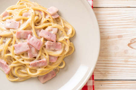 homemade spaghetti white cream sauce with ham - Italian food styleの写真素材