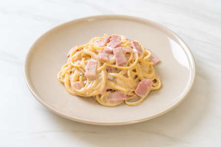 homemade spaghetti white cream sauce with ham - Italian food styleの写真素材