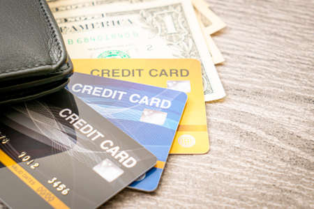 wallet with money and credit card - Economy and finance conceptの写真素材