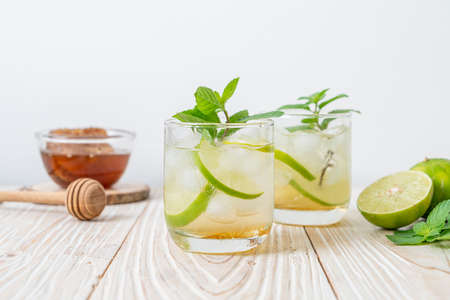 iced honey and lime soda with mint - refreshing drinkの写真素材