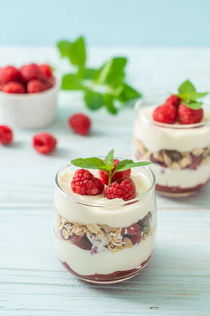 fresh raspberry and yogurt with granola - Healthy food style