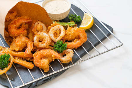 deep fried seafood (shrimps and squid) with mix vegetable - unhealthy food styleの写真素材