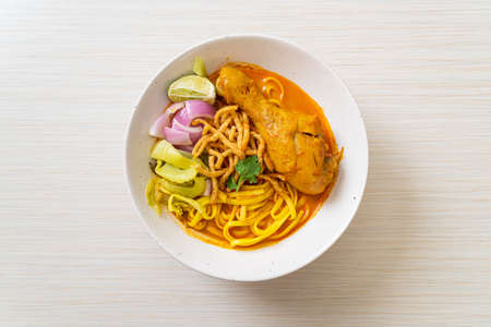 Northern Thai noodle curry soup with chicken (Kao Soi Kai) - Thai food styleの写真素材