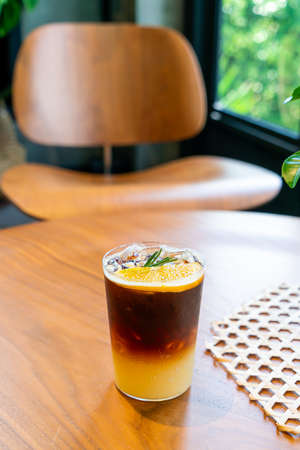 yuzu orange coffee glass in coffee shop cafe restaurantの写真素材