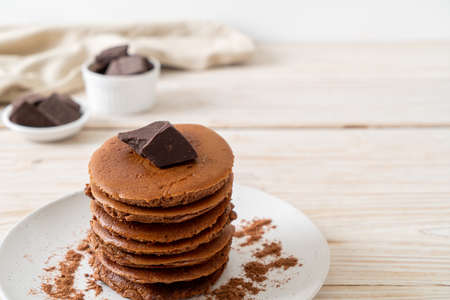 chocolate pancake stack with chocolate powderの写真素材