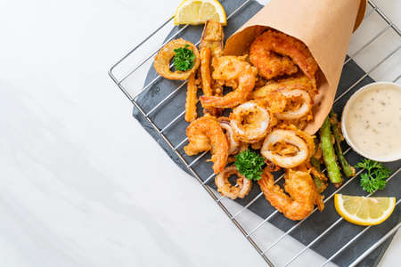 deep fried seafood (shrimps and squid) with mix vegetable - unhealthy food styleの写真素材