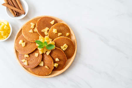 apple pancake or apple crepe with cinnamon powder