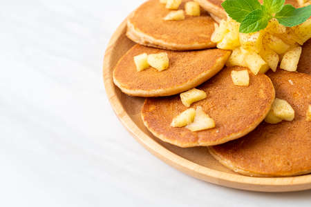 apple pancake or apple crepe with cinnamon powder