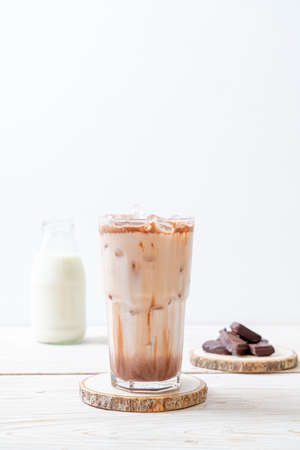 Iced chocolate milkshake drink on wood backgroundの写真素材