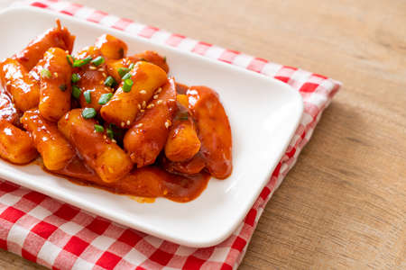 Korean rice cake stick with sausage in spicy sauce (Tteokbokki) - Korean food styleの写真素材