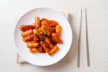 Korean rice cake stick with sausage in spicy sauce (Tteokbokki) - Korean food styleの写真素材