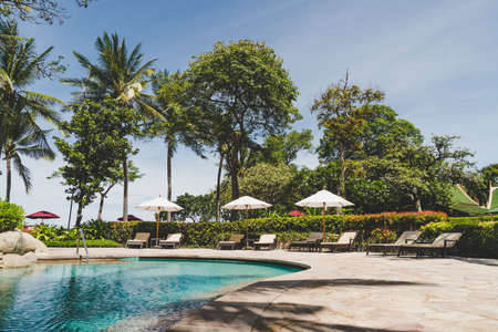 bed pool around swimming pool in hotel resort - holiday and vacation conceptのeditorial素材