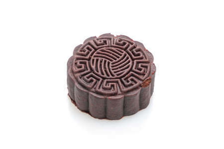 moon cake dark chocolate flavour isolated on white background