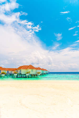 Beautiful tropical Maldives resort hotel and island with beach and sea - holiday vacation background concepの写真素材
