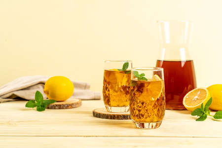 glass of ice lemon tea with mintの写真素材