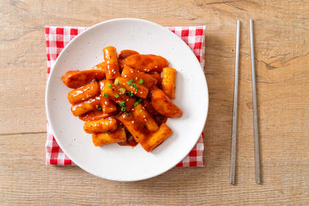Korean rice cake stick with sausage in spicy sauce (Tteokbokki) - Korean food styleの写真素材