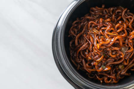 Korean black spaghetti or instant noodle with roasted chajung soybean sauce (chapagetti) - Korean food styleの写真素材