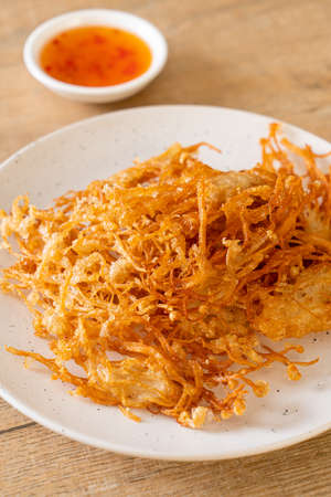 Fried Enoki Mushroom or Golden Needle Mushroom - vegan and vegetarian food styleの写真素材
