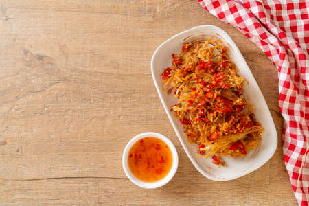 Fried Enoki Mushroom or Golden Needle Mushroom with Salt and Chilli - vegan and vegetarian food styleの写真素材