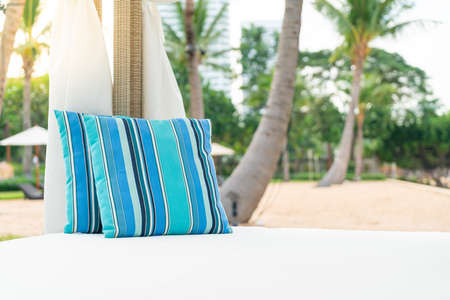 comfortable pillow on pavilion near beach - travel and vacation conceptの写真素材