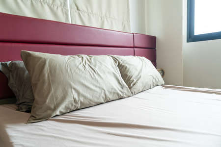 pillow decoration on bed in bedroomの写真素材
