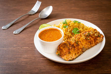 pan seared salmon tandoori with masala rice - muslim food styleの写真素材