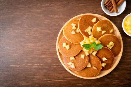 apple pancake or apple crepe with cinnamon powder