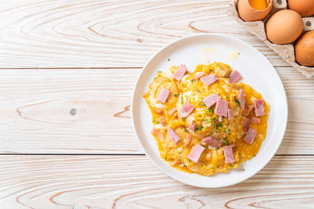 Creamy Omelet with Ham on Rice or Rice with Ham and Soft Omeletの写真素材