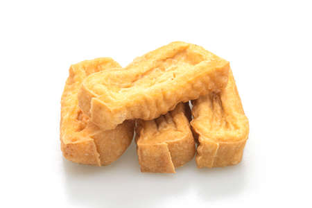 fried tofu isolated on white background - vegan and vegetarian food style